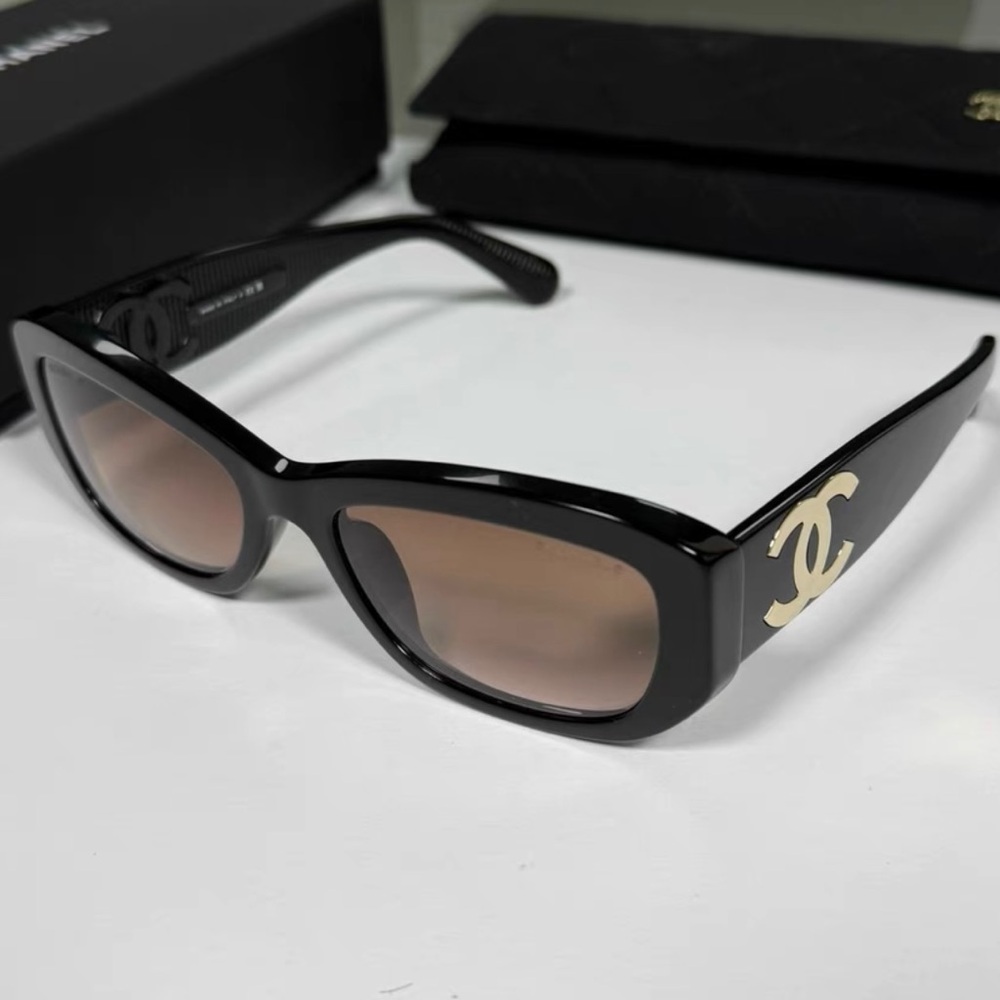 CHANEL Black Sunglasses with Gold Accents
